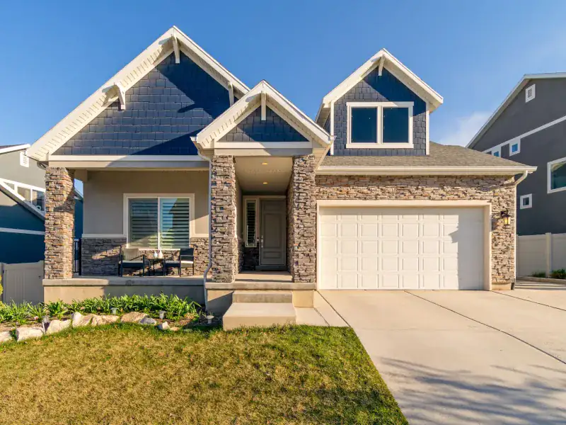 Stone-and-shingle craftsman home in Frisco with a new architectural shingle roof